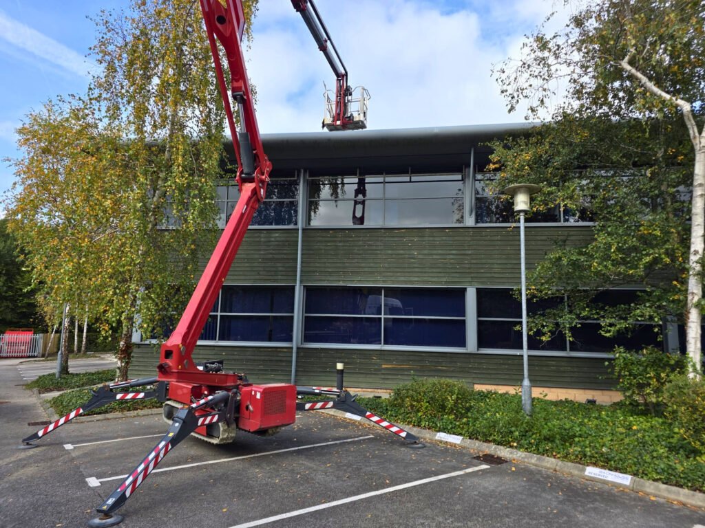 Tracked Access (spider) lift commercial building maintenance